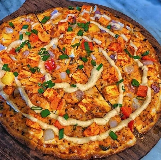 Flaming Paneer Pizza.